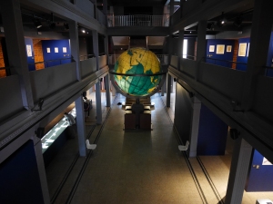The Mundaneum's central atrium; the universality of the project is indicated by the prominent globe.